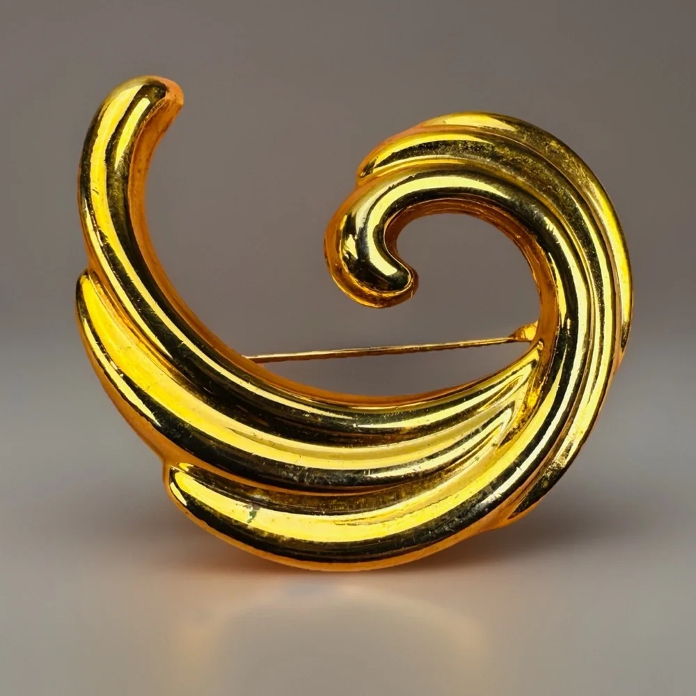Vintage Goldtone Weighted Swirl Brooch